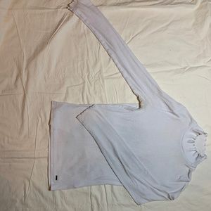 white ruffled turtle neck